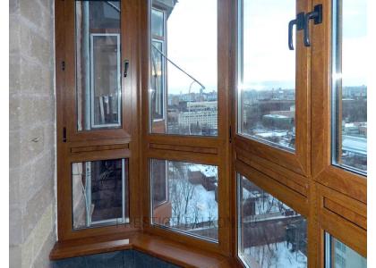 Французское остекление балкона профилем Veka с ламинированием под дерево в Химках